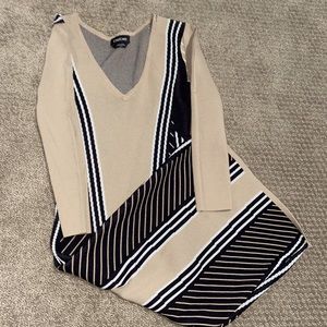 Cute bebe dress with black,white,and cream design!